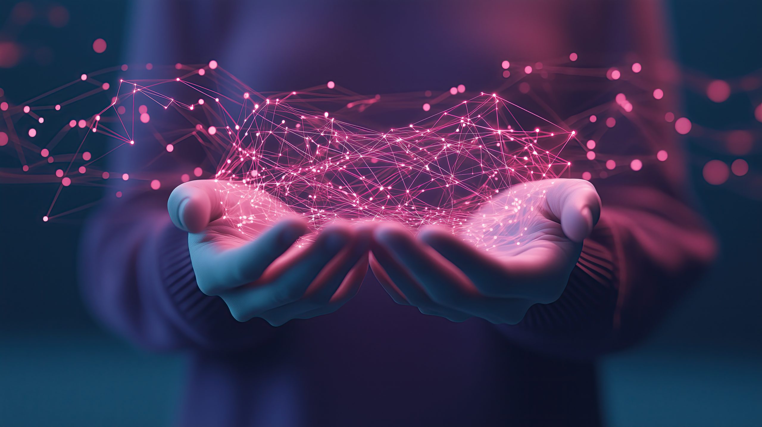 conceptual image of digital ownership with glowing connections in hands A set of hands, palm side up wit magenta-colored holographic dots and lines floating above them.